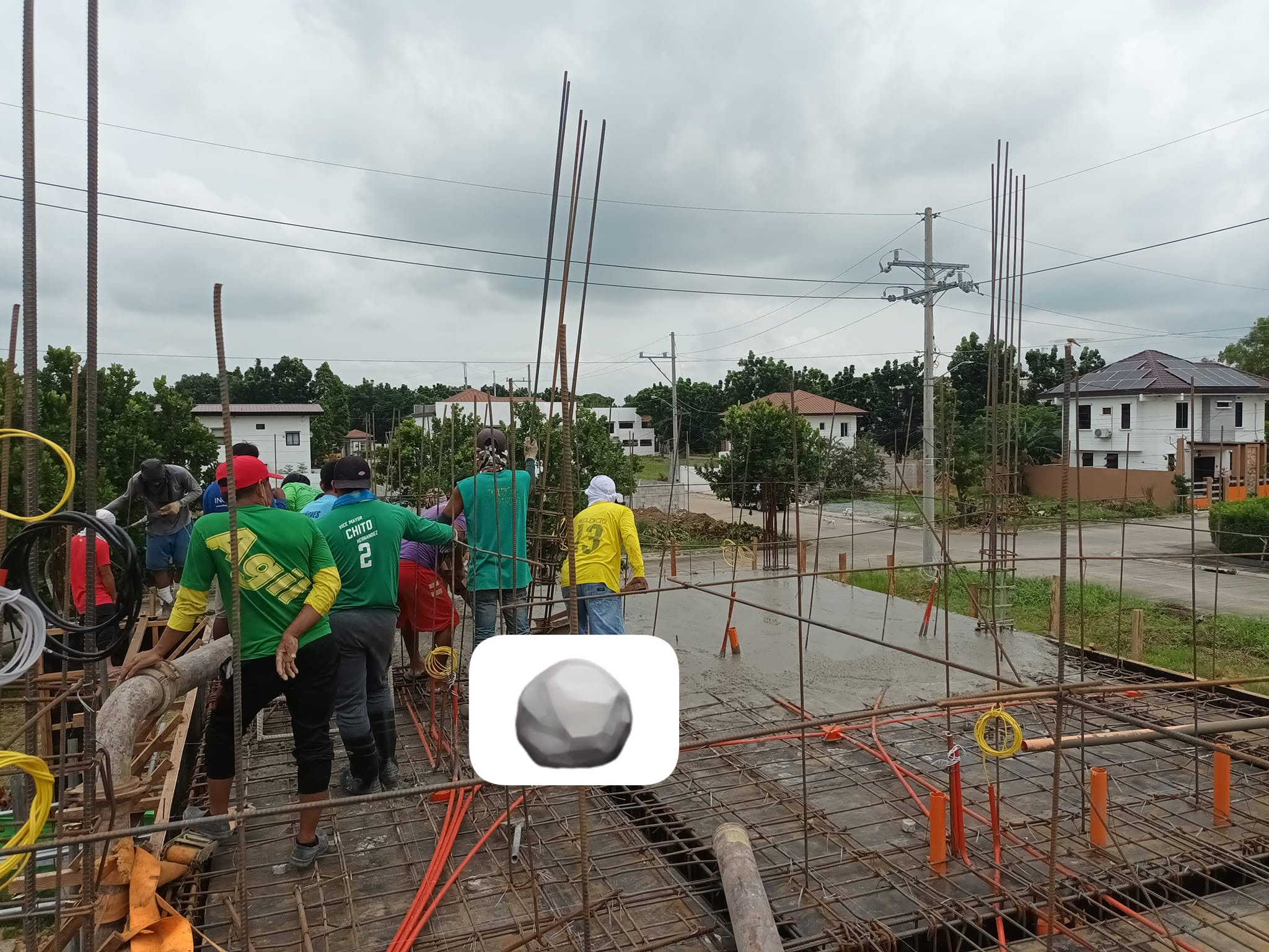 Construction crew on reinforced concrete slab