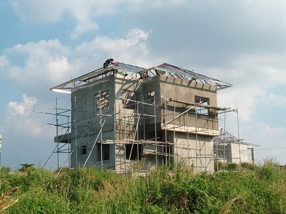 House construction with scaffolding