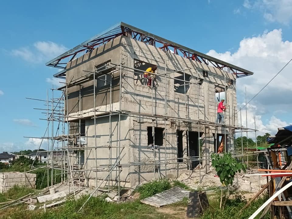 House under construction with scaffolding